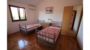 Posteľ alebo postele v izbe v ubytovaní Villa Neela