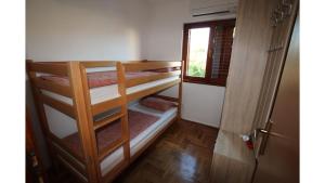 Posteľ alebo postele v izbe v ubytovaní Villa Neela