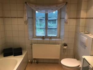 Kupaonica u objektu Haus-Dorfstrasse