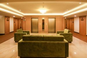 Emerald Clarks Inn Suites的休息区
