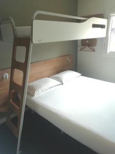 a couple of bunk beds in a room at SUN1 ALBERTON in Johannesburg