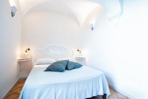 Postel nebo postele na pokoji v ubytování B&B Ercole di Amalfi