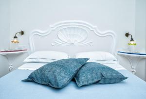 Postel nebo postele na pokoji v ubytování B&B Ercole di Amalfi
