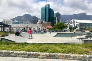 a group of people riding skateboards at a skate park at MOY Guesthouse & Backpackers in Cape Town