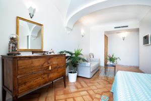 Postel nebo postele na pokoji v ubytování B&B Ercole di Amalfi
