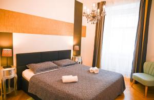 Кровать или кровати в номере Royal Residence Hofburg