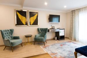 A television and/or entertainment centre at Florya Novi Hotel