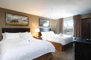 Postel nebo postele na pokoji v ubytování Canad Inns Destination Centre Transcona + 20 fotografií