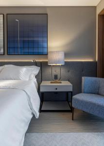 Postel nebo postele na pokoji v ubytování LK Design Hotel Florianópolis