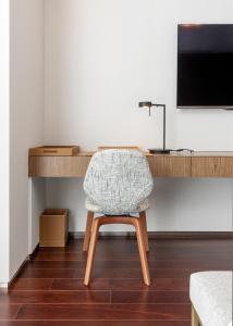 TV a/nebo společenská místnost v ubytování LK Design Hotel Florianópolis