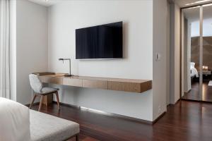 TV a/nebo společenská místnost v ubytování LK Design Hotel Florianópolis