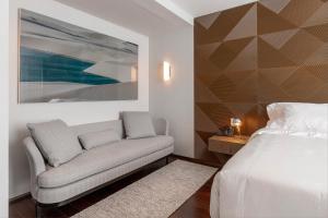 Postel nebo postele na pokoji v ubytování LK Design Hotel Florianópolis