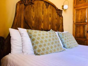 Postel nebo postele na pokoji v ubytování Hotel Boutique Casa de las Manrique