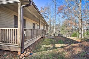 a porch of a house with a porch istg istg at Blairsville Home with Deck and Stunning Mountain Views in Hood