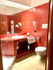 Koupelna v ubytování Hotel Grillo