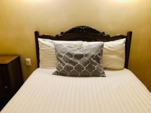 Postel nebo postele na pokoji v ubytování Hotel Boutique Casa de las Manrique