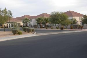 an empty street in front of a house at Mesquite Nevada Vacation Rental - Ground Level and double car garage in Mesquite