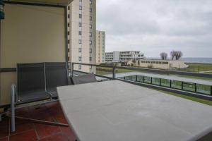 Balkón nebo terasa v ubytování Vier Jahreszeiten Haus 6 Whg 08