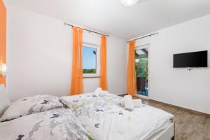Posteľ alebo postele v izbe v ubytovaní Villa Aurelia