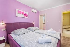 Posteľ alebo postele v izbe v ubytovaní Villa Aurelia