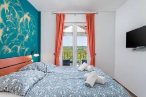 Posteľ alebo postele v izbe v ubytovaní Villa Aurelia + 37 fotografií