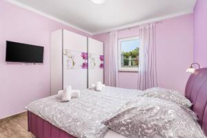Posteľ alebo postele v izbe v ubytovaní Villa Aurelia