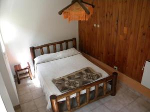 Кровать или кровати в номере Club Hostel Jujuy