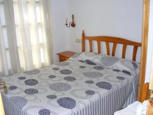 Posteľ alebo postele v izbe v ubytovaní Apartaments l'Arrel
