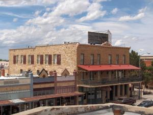 an old brick building on a city street at Hotel Eklund in Clayton