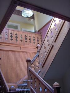
a staircase leading up to a stair case at Hotel Eklund in Clayton
