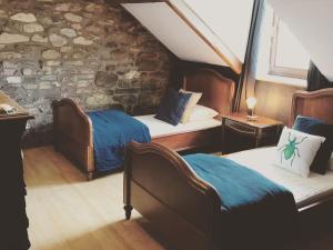 Postel nebo postele na pokoji v ubytování Group Escape in Vielsalm