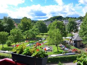 Modern apartment on the first floor near Willingen with private south west facing balconyの敷地内または近くにあるプールの景色