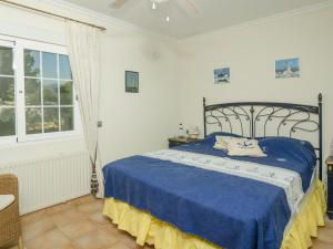 Łóżko lub łóżka w pokoju w obiekcie Villa in L'Albir with Pool and Near Golf