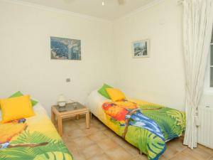 Łóżko lub łóżka w pokoju w obiekcie Villa in L'Albir with Pool and Near Golf