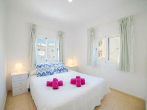 Ein Bett oder Betten in einem Zimmer der Unterkunft Apartment in Alcúdia with Bay of Pollensa View