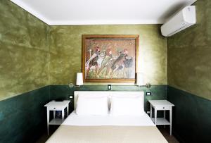 Postel nebo postele na pokoji v ubytování Hotel Diana
