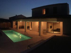 a house with a swimming pool in front of it at Luxury Villa in Malauc ne with Private Swimming Pool in Malaucène