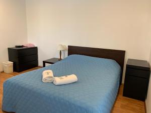Postel nebo postele na pokoji v ubytování Beaconsfield Lodge Motel