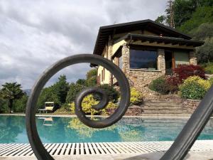 Piscina di Classy Villa in Pisogne with Garden BBQ Pool o nelle vicinanze