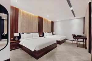 Postel nebo postele na pokoji v ubytování CHAU KHUONG HOTEL + 37 fotografií