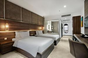 Postel nebo postele na pokoji v ubytování CHAU KHUONG HOTEL