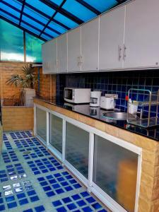 Kuchyň nebo kuchyňský kout v ubytování 4poolvillas