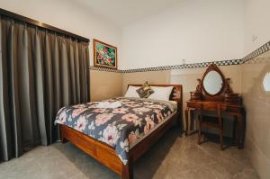 Postel nebo postele na pokoji v ubytování Dados Guest House