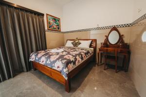 Postel nebo postele na pokoji v ubytování Dados Guest House