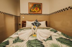 Postel nebo postele na pokoji v ubytování Dados Guest House