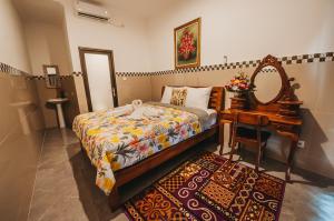 Postel nebo postele na pokoji v ubytování Dados Guest House