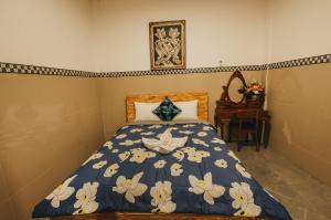 Postel nebo postele na pokoji v ubytování Dados Guest House