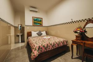 Postel nebo postele na pokoji v ubytování Dados Guest House