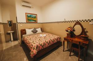 Postel nebo postele na pokoji v ubytování Dados Guest House