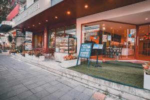 a grocery store with a sign in front of it at SK Boutique Mahanakhon in Bangkok